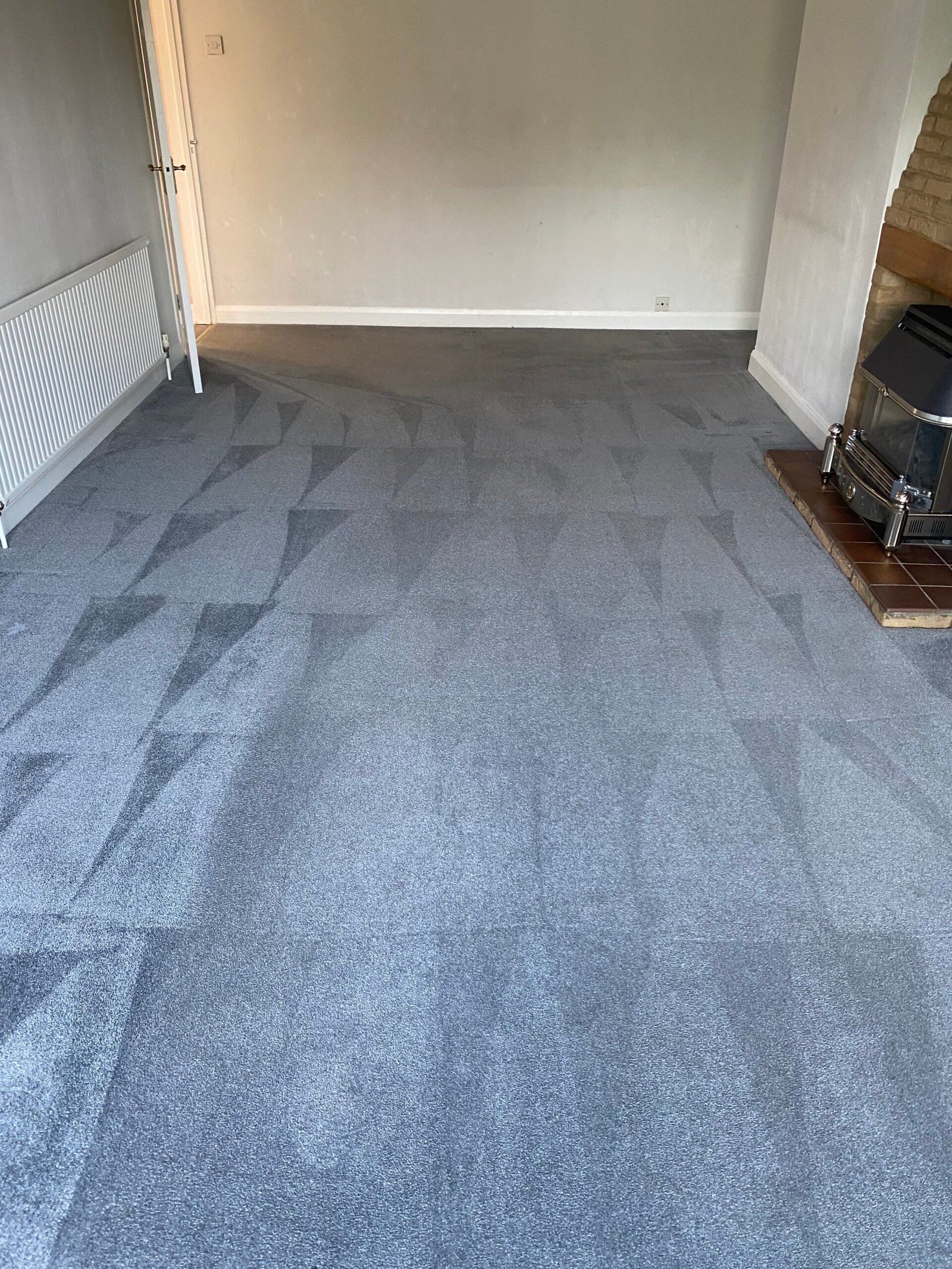 The same carpet after a PurgeBright deep clean, colour restored